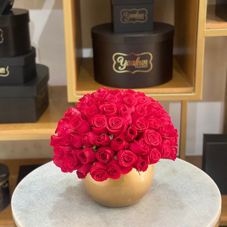Pecera con 100 rosas esfera
